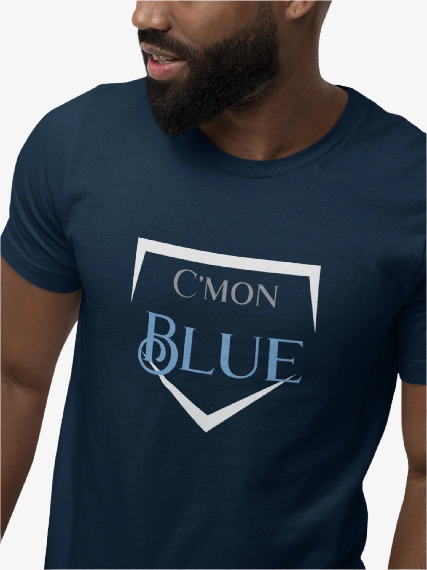 Man wearing a navy blue t-shirt with 'C'MON BLUE' text design.